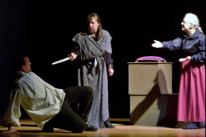 two men and a man during a play